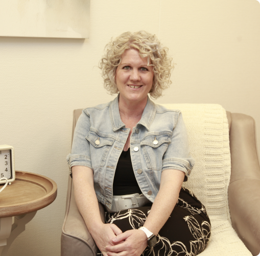 Portrait of Anya Stang, M.C., a Calgary-based psychologist specializing in trauma therapy and Internal Family Systems (IFS) Therapy, founder of Connect Heal Grow Psychology.