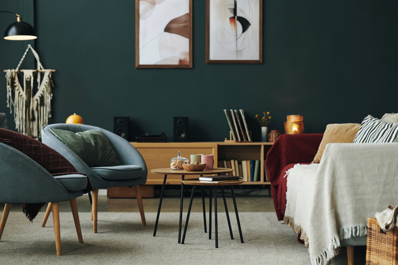 Warm, comfortable therapy room with soft lighting, chairs, and calming decor.