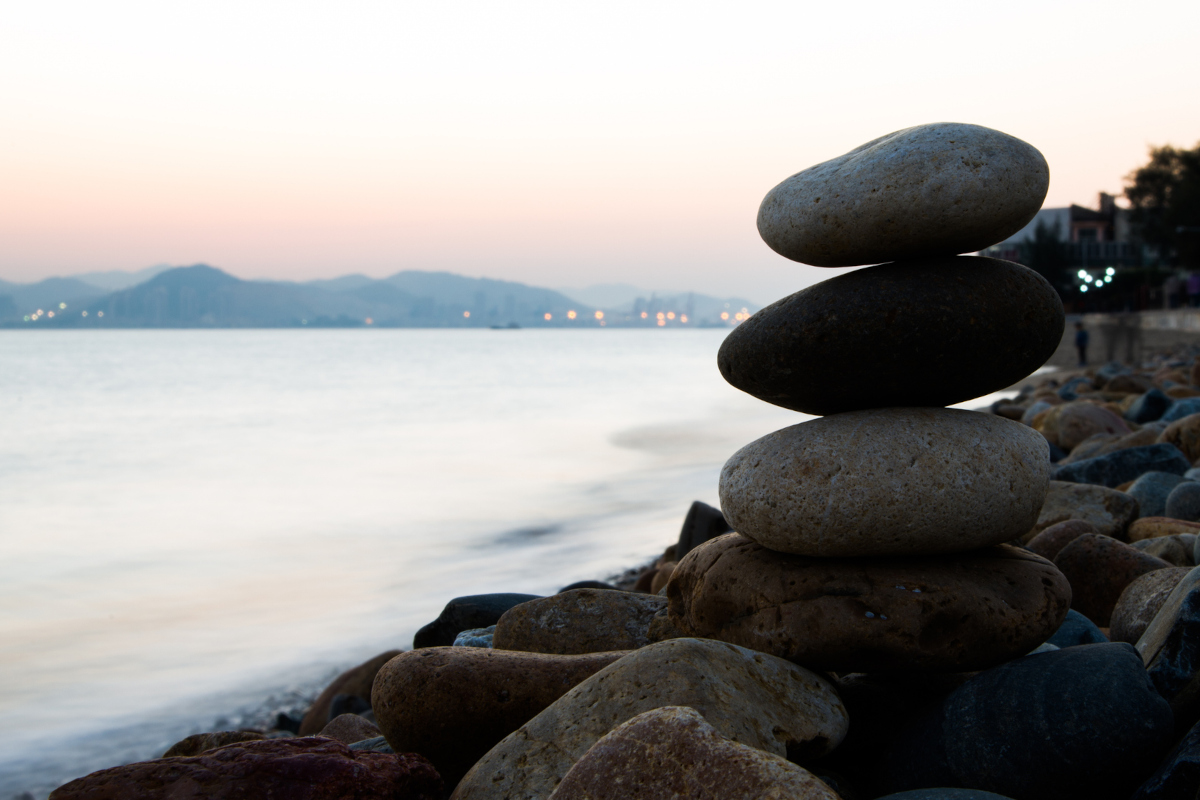 Calm lake landscape representing anxiety rumination and trauma therapy in Calgary